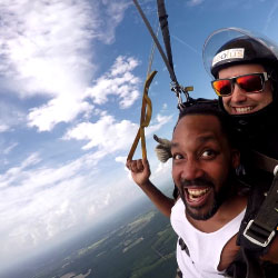 Male tandem student enjoying parachute flight while skydiving at Jump Georgia near Augusta GA